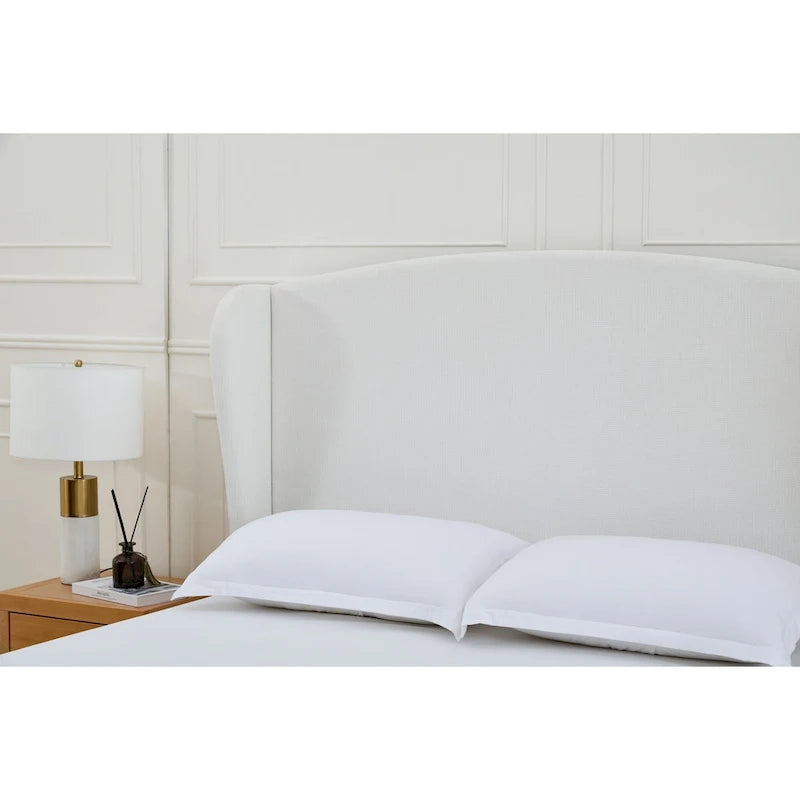 Lit plateforme capitonné à tête de lit à oreilles